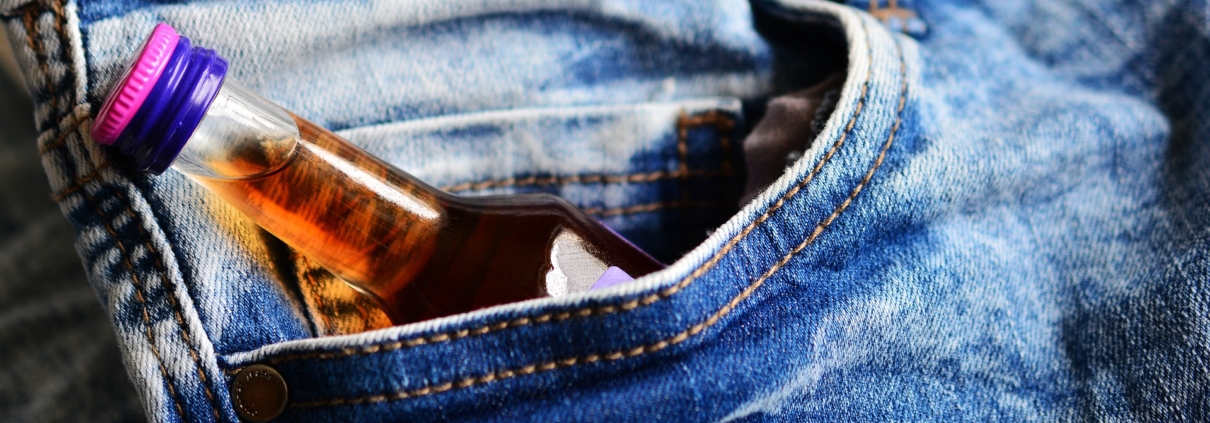 Bottle of alcohol in pocket